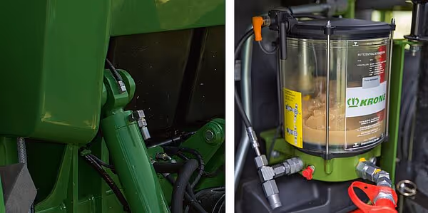 Detaljbilde som viser hydrauliske komponenter og et sentralt smøresystem på en KRONE Big M 450 slåmaskin. Bildet viser både hydraulikkslanger og en automatisk smørepumpe.