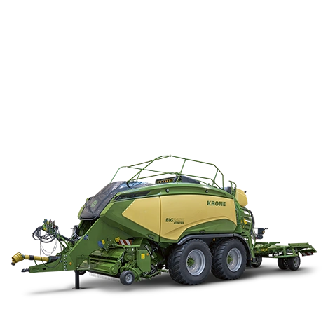 KRONE Big Pack HDP II storballpresse i grønn og gul farge mot svart bakgrunn.