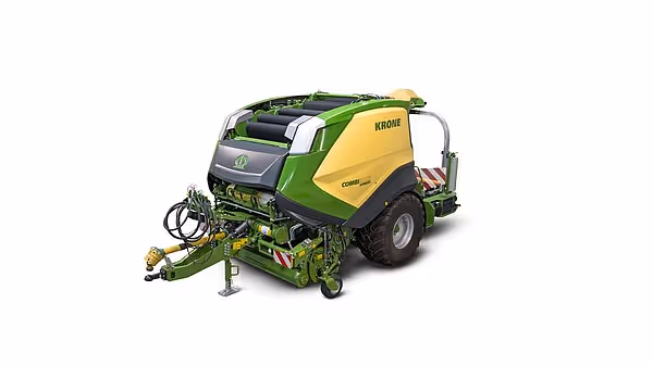 KRONE CombiPack HDP rundballpresse i studiofoto, som viser maskinens komplette design med grønn og gul fargekombinasjon.