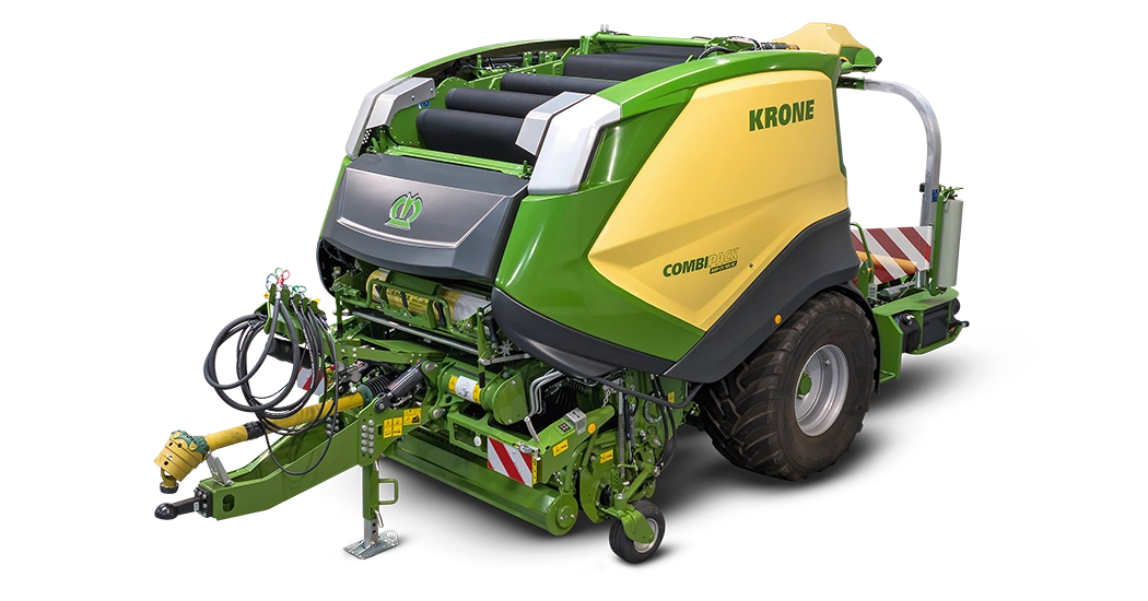 KRONE CombiPack HDP rundballpresse i grønt og gult design, fotografert mot svart bakgrunn.