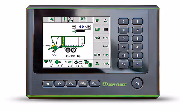 KRONE MX tablet med nummertastatur viser fôrvogn med vekt på 11.990 kg og oversikt over lastedata og funksjoner.