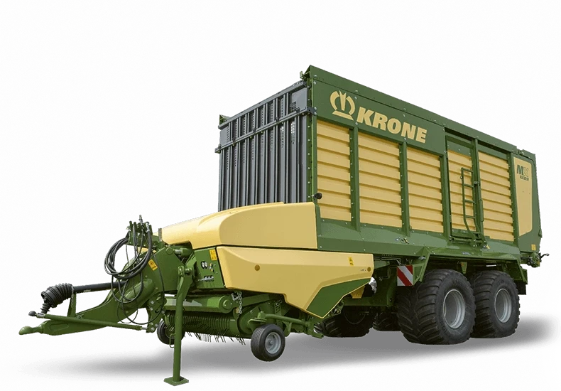 KRONE MX silofôrvogn med gul og grønn farge vist fra siden mot svart bakgrunn.