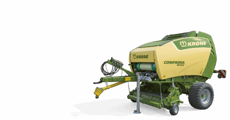 Krone Comprima Plus rundballepresse med variabel baliekammer, pickup-aggregat, PTO-aksel og hydraulikkoblinger, fotografert fra siden mot hvit bakgrunn.