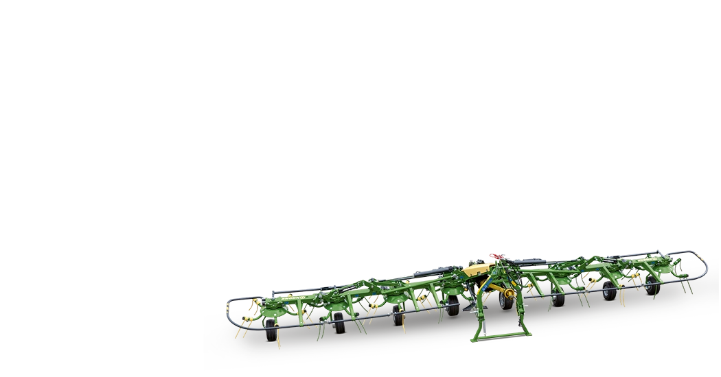 En grønn KRONE vendro landbruksmaskin fotografert mot svart bakgrunn. Maskinen har lange armer med rotortinder for vending og harking av høy.